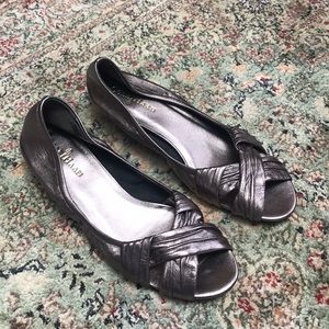 Cole Haan Nikeair silver sandals.